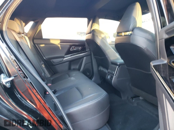 2023 Toyota bZ4X XLE z VIN JTMAAAAA9PA001408, wystawiony jako Copart lot #81972433 z przebiegiem 10 917 mil mil oraz . Historia ofert i sprzedaży dostępna na DreamBid. Obrazek 12.