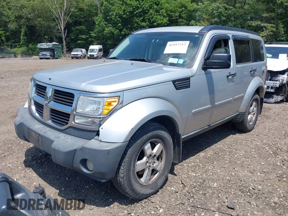 2009 Dodge Nitro SE with VIN 1D8GU28K49W530813, listed as a IAAI auction lot 42557717 with 125,772 mi miles and . Bid and sale history available at DreamBid. Image 2.