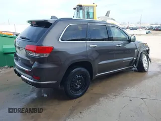 2015 Jeep Grand Cherokee Summit with VIN 1C4RJFJT1FC726330, listed as a IAAI auction lot 41781127 with 138,425 mi miles. Bid and sale history available at carsss.com. Image 4.