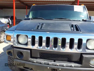 2004 Hummer H2 with VIN 5GRGN23U64H101592, listed as a IAAI auction lot 41379405 with 174,672 mi miles. Bid and sale history available at carsss.com. Image 10.