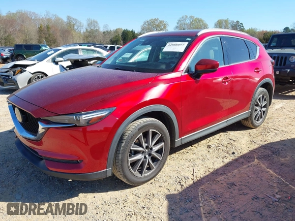 2018 Mazda CX-5 Grand Touring with VIN JM3KFADM3J0380826, listed as a IAAI auction lot 41888097 with 70,529 mi miles. Bid and sale history available at carsss.com. Image 18.