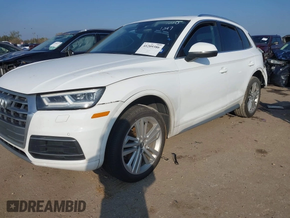 2018 Audi Q5 Premium Plus with VIN WA1BNAFY1J2220714, listed as a IAAI auction lot 41209386 with 70,012 mi miles and . Bid and sale history available at DreamBid. Image 16.