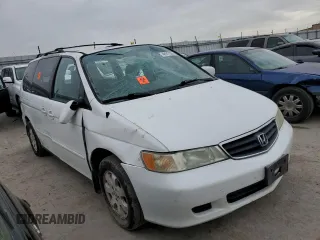 2004 Honda Odyssey EX with VIN 5FNRL18634B078051, listed as a Copart auction lot 49917355 with 269,947 mi miles and Salvage Title. Bid and sale history available at DreamBid. Image 4.