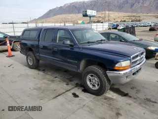 2002 Dodge Dakota SLT with VIN 1B7HG48N32S720700, listed as a Copart auction lot 80234494 with 207,035 mi miles and Salvage Title. Bid and sale history available at carsss.com. Image 4.