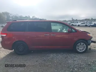 2014 Toyota Sienna XLE with VIN 5TDYK3DCXES471676, listed as a IAAI auction lot 41853038 with 169,790 mi miles. Bid and sale history available at carsss.com. Image 13.