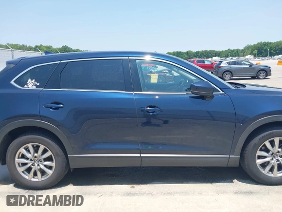 2018 Mazda CX-9 Touring with VIN JM3TCBCY3J0220372, listed as a IAAI auction lot 42405192 with 104,556 mi miles and . Bid and sale history available at DreamBid. Image 13.