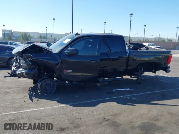 2018 Chevrolet Silverado 1500 LTZ with VIN 3GCUKSEC1JG560567, listed as a IAAI auction lot 41664625 with Not Provided miles and . Bid and sale history available at DreamBid. Image 13.
