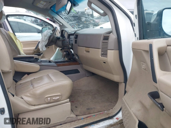 2012 Nissan Titan SL with VIN 1N6AA0EC7CN311109, listed as a IAAI auction lot 41420110 with 209,731 mi miles and . Bid and sale history available at DreamBid. Image 5.
