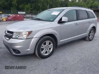 2012 Dodge Journey SXT with VIN 3C4PDCBBXCT323532, listed as a IAAI auction lot 42471610 with 188,103 mi miles and . Bid and sale history available at DreamBid. Image 2.