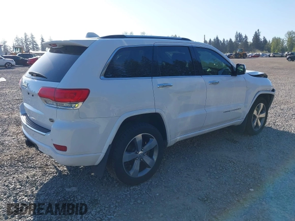 2015 Jeep Grand Cherokee Overland with VIN 1C4RJFCT6FC653386, listed as a IAAI auction lot 42084723 with 101,993 mi miles. Bid and sale history available at carsss.com. Image 4.