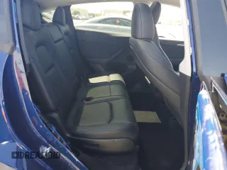 2024 Tesla Model Y Long Range z VIN 7SAYGAEE3RF034699, wystawiony jako Copart lot #54523815 z przebiegiem 9 764 mil mil oraz Szkoda całkowita • Salvage title. Historia ofert i sprzedaży dostępna na DreamBid. Obrazek 10.