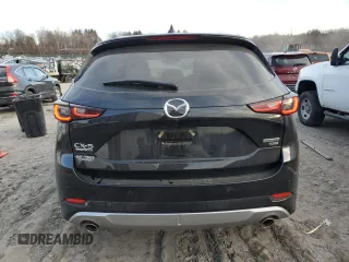 2024 Mazda CX-5 2.5 Turbo Signature with VIN JM3KFBXY7R0515256, listed as a Copart auction lot 87404694 with 4,699 mi miles and Salvage Title. Bid and sale history available at carsss.com. Image 6.