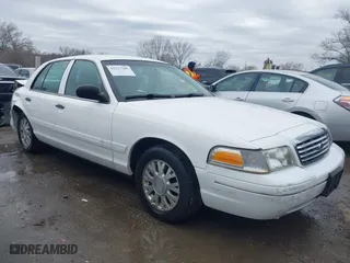 2005 Ford Crown Victoria LX with VIN 2FAFP74WX5X105415, listed as a IAAI auction lot 41523383 with 119,222 mi miles. Bid and sale history available at carsss.com. Image 13.