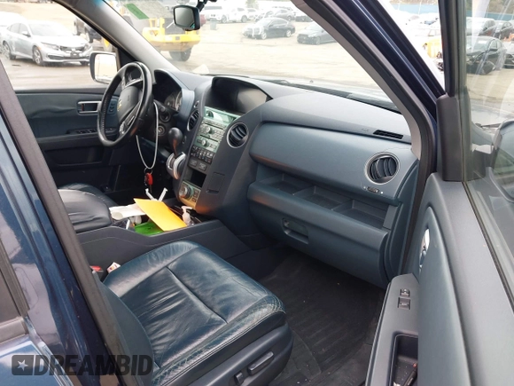 2009 Honda Pilot Touring with VIN 5FNYF48929B040199, listed as a IAAI auction lot 41466006 with 167,959 mi miles and . Bid and sale history available at carsss.com. Image 5.