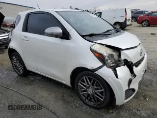 2012 Scion iQ with VIN JTNJJXB0XCJ011508, listed as a Copart auction lot 42368065 with 161,965 mi miles and Salvage title. Bid and sale history available at DreamBid. Image 4.