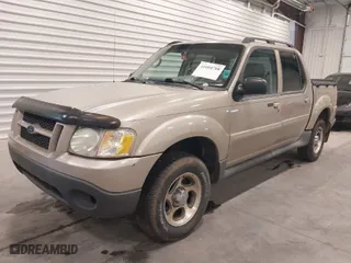 2004 Ford Explorer Sport Trac XLS with VIN 1FMZU77KX4UA39054, listed as a IAAI auction lot 41604708 with 256,789 mi miles. Bid and sale history available at carsss.com. Image 2.