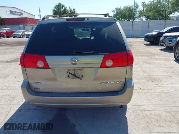 2010 Toyota Sienna XLE with VIN 5TDYK4CC5AS292110, listed as a IAAI auction lot 42055505 with 107,390 mi miles. Bid and sale history available at carsss.com. Image 16.