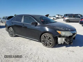 2014 Toyota Camry L with VIN 4T4BF1FK2ER376447, listed as a Copart auction lot 82886974 with 112,833 mi miles and Salvage Title. Bid and sale history available at DreamBid. Image 4.