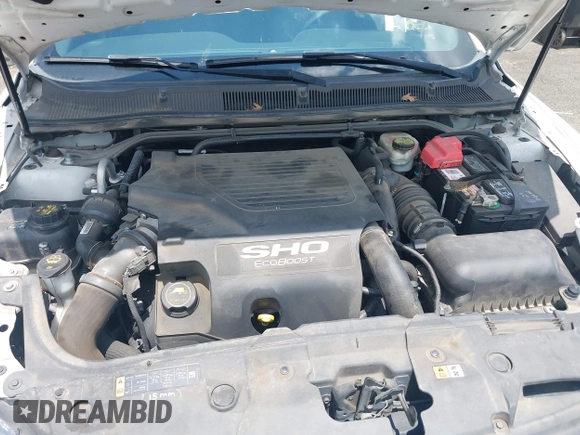 2015 Ford Taurus SHO with VIN 1FAHP2KT5FG206096, listed as a IAAI auction lot 42486198 with 120,940 mi miles and . Bid and sale history available at DreamBid. Image 10.