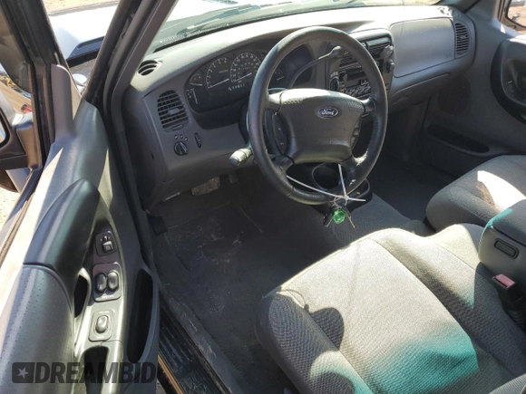 2001 Ford Ranger XL Fleet with VIN 1FTZR15E21TA42192, listed as a Copart auction lot 51439005 with 117,334 mi miles and Salvage Title. Bid and sale history available at DreamBid. Image 8.