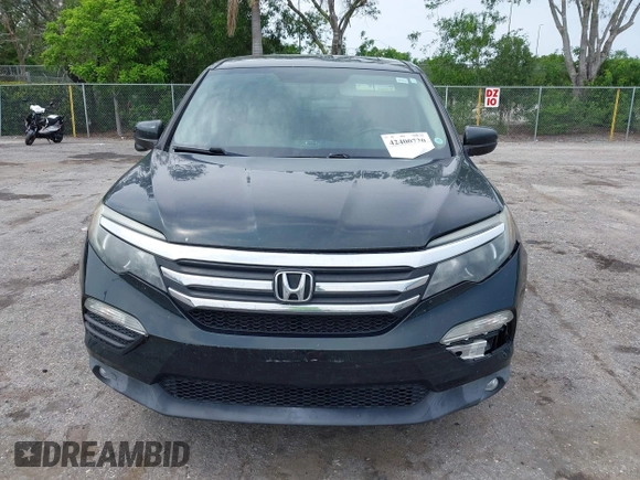 2017 Honda Pilot EX-L with VIN 5FNYF6H50HB033968, listed as a IAAI auction lot 42400720 with 119,597 mi miles and . Bid and sale history available at DreamBid. Image 12.