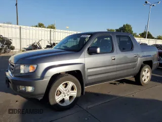 2010 Honda Ridgeline RTL with VIN 5FPYK1F5XAB002757, listed as a Copart auction lot 74548944 with 255,416 mi miles and Salvage Title. Bid and sale history available at carsss.com. Image 1.