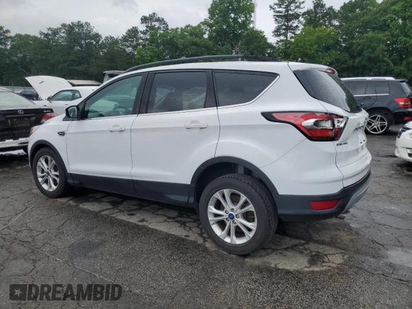 2017 Ford Escape SE z VIN 1FMCU0GD7HUC33240, wystawiony jako Copart lot #59627995 z przebiegiem 105 670 mil mil oraz Czysty tytuł • Clean title. Historia ofert i sprzedaży dostępna na DreamBid. Obrazek 2.