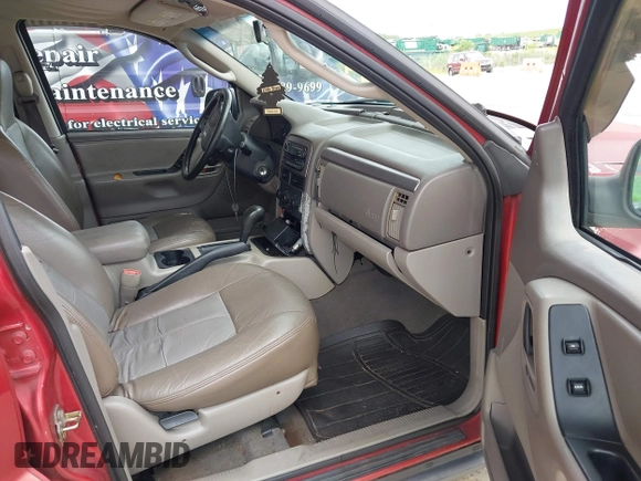 2003 Jeep Grand Cherokee Laredo z VIN 1J4GX48SX3C604630, wystawiony jako IAAI lot #42762013 z przebiegiem 202 563 mil mil oraz . Historia ofert i sprzedaży dostępna na DreamBid. Obrazek 5.