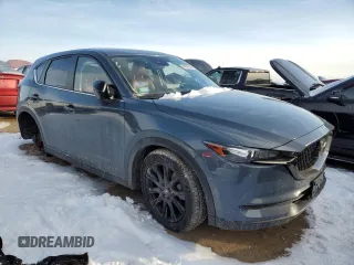 2021 Mazda CX-5 Touring with VIN JM3KFBCM0M0395988, listed as a Copart auction lot 45539925 with 39,889 mi miles and Salvage Title. Bid and sale history available at carsss.com. Image 4.