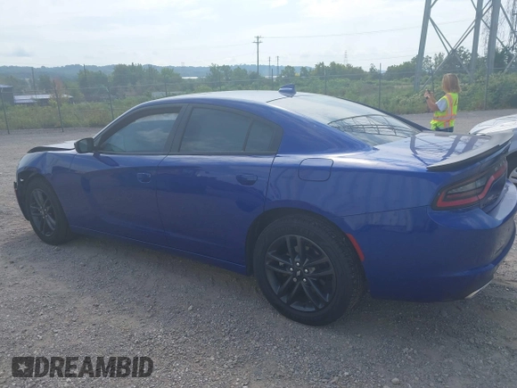 2019 Dodge Charger SXT with VIN 2C3CDXJG4KH550424, listed as a IAAI auction lot 40224159 with 56,988 mi miles and . Bid and sale history available at DreamBid. Image 14.