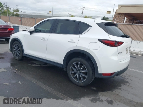 2018 Mazda CX-5 Grand Touring with VIN JM3KFADM1J0309995, listed as a IAAI auction lot 41977003 with 75,303 mi miles. Bid and sale history available at carsss.com. Image 3.