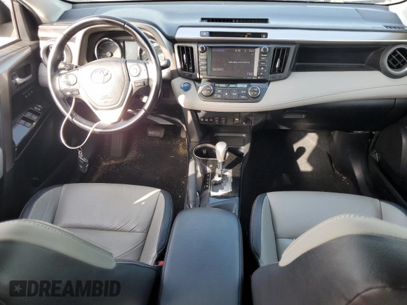 2016 Toyota RAV4 Limited z VIN JTMDJREV1GD013351, wystawiony jako Copart lot #60057045 z przebiegiem 127 355 mil mil oraz Szkoda całkowita • Salvage title. Historia ofert i sprzedaży dostępna na DreamBid. Obrazek 8.
