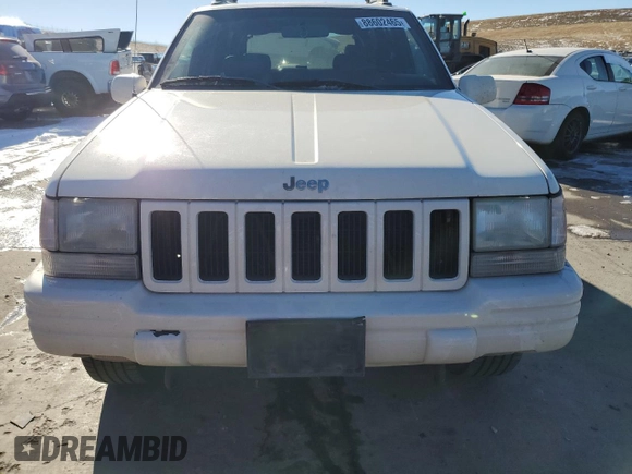 1998 Jeep Grand Cherokee Limited with VIN 1J4GZ88Z9WC180182, listed as a Copart auction lot 88602465 with 266,008 mi miles and Clean Title. Bid and sale history available at carsss.com. Image 5.