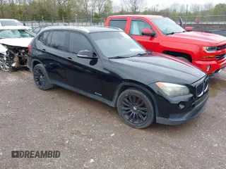 2013 BMW X1 28i with VIN WBAVM1C5XDVW46529, listed as a IAAI auction lot 41975148 with 156,968 mi miles. Bid and sale history available at carsss.com. Image 1.