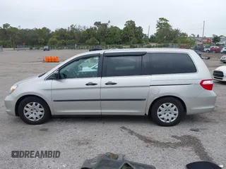 2006 Honda Odyssey LX with VIN 5FNRL38206B129663, listed as a IAAI auction lot 40978284 with 290,666 mi miles. Bid and sale history available at carsss.com. Image 14.