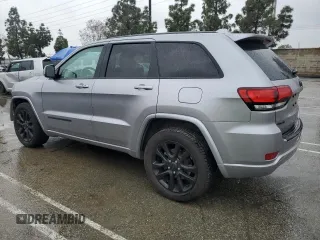 2018 Jeep Grand Cherokee Laredo с VIN 1C4RJFAG8JC367974, выставлен на аукционе Copart как лот 48883405 с пробегом 99 311 миль миль и Списание • Salvage title. История ставок и продаж доступна на DreamBid. Изображение 2.