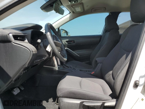 2024 Toyota Corolla Cross LE with VIN 7MUCAAAG7RV090677, listed as a Copart auction lot 57615565 with 6,910 mi miles and Salvage title. Bid and sale history available at DreamBid. Image 7.