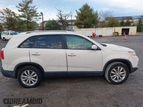 2011 Kia Sorento EX with VIN 5XYKU4A13BG003130, listed as a IAAI auction lot 41209337 with 162,058 mi miles. Bid and sale history available at carsss.com. Image 13.