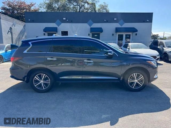 2020 Infiniti QX60 Luxe with VIN 5N1DL0MM9LC538281, listed as a Copart auction lot 56608075 with 130,337 mi miles and Non Repairable. Bid and sale history available at DreamBid. Image 14.