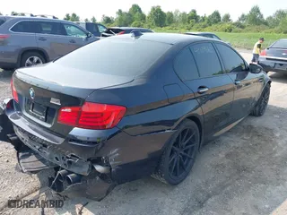 2013 BMW M5 with VIN WBSFV9C56DC772507, listed as a IAAI auction lot 40109662 with 127,881 mi miles. Bid and sale history available at carsss.com. Image 4.