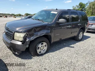 2010 Chevrolet Tahoe LS with VIN 1GNUCAE0XAR285608, listed as a Copart auction lot 61602245 with 199,344 mi miles and Salvage title. Bid and sale history available at DreamBid. Image 1.
