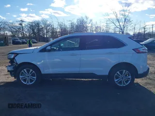 2019 Ford Edge SEL z VIN 2FMPK4J94KBB99418, wystawiony jako IAAI lot #41294393 z przebiegiem 57 706 mil mil oraz . Historia ofert i sprzedaży dostępna na DreamBid. Obrazek 14.