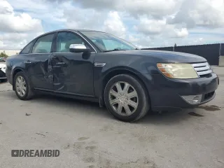 2008 Ford Taurus Limited with VIN 1FAHP25W78G128851, listed as a Copart auction lot 61254015 with 216,335 mi miles and Salvage title. Bid and sale history available at DreamBid. Image 4.