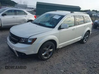 2016 Dodge Journey Crossroad with VIN 3C4PDCGGXGT118920, listed as a IAAI auction lot 42764449 with 102,937 mi miles and . Bid and sale history available at DreamBid. Image 2.