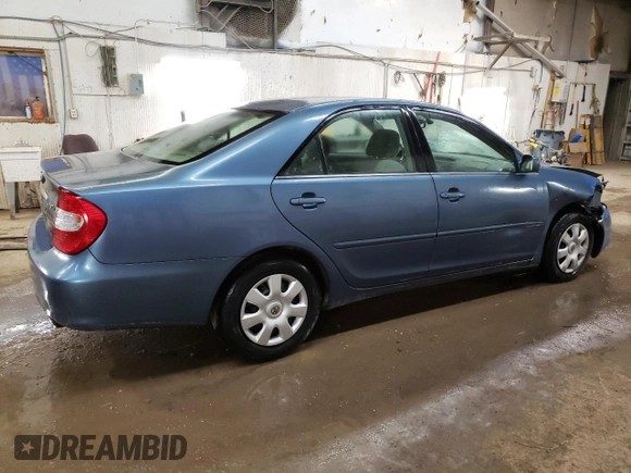 2004 Toyota Camry LE with VIN 4T1BE32K64U812388, listed as a Copart auction lot 82777563 with 209,219 mi miles and Clean Title. Bid and sale history available at carsss.com. Image 3.