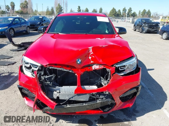 2021 BMW X4 M with VIN 5YMUJ0C08M9H70033, listed as a IAAI auction lot 41671276 with 18,151 mi miles. Bid and sale history available at carsss.com. Image 13.
