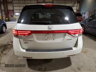 2014 Honda Odyssey Touring with VIN 5FNRL5H90EB137575, listed as a Copart auction lot 54606535 with 168,714 mi miles and Salvage title. Bid and sale history available at DreamBid. Image 6.