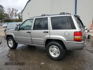 1997 Jeep Grand Cherokee Limited with VIN 1J4GZ78Y0VC682949, listed as a Copart auction lot 82152424 with 194,576 mi miles and Salvage Title. Bid and sale history available at carsss.com. Image 2.