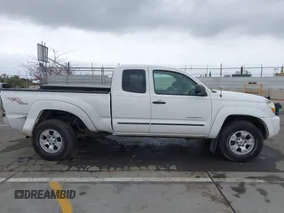 2005 Toyota Tacoma z VIN 5TEUU42N35Z060609, wystawiony jako IAAI lot #42119427 z przebiegiem 245 280 mil mil oraz . Historia ofert i sprzedaży dostępna na DreamBid. Obrazek 14.