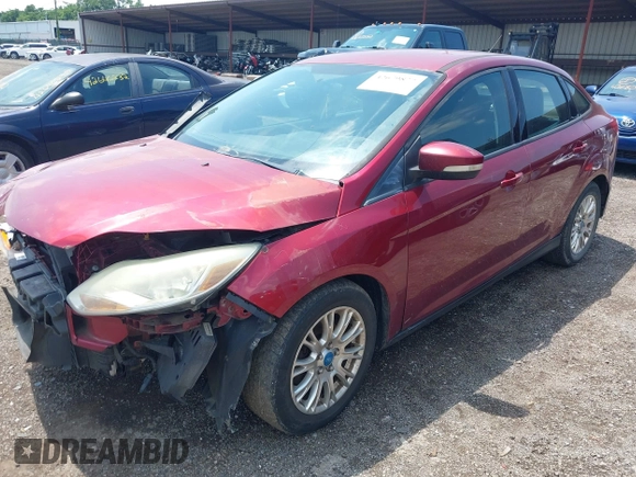 2013 Ford Focus SE z VIN 1FADP3F26DL242146, wystawiony jako IAAI lot #42679877 z przebiegiem 207 908 mil mil oraz . Historia ofert i sprzedaży dostępna na DreamBid. Obrazek 2.